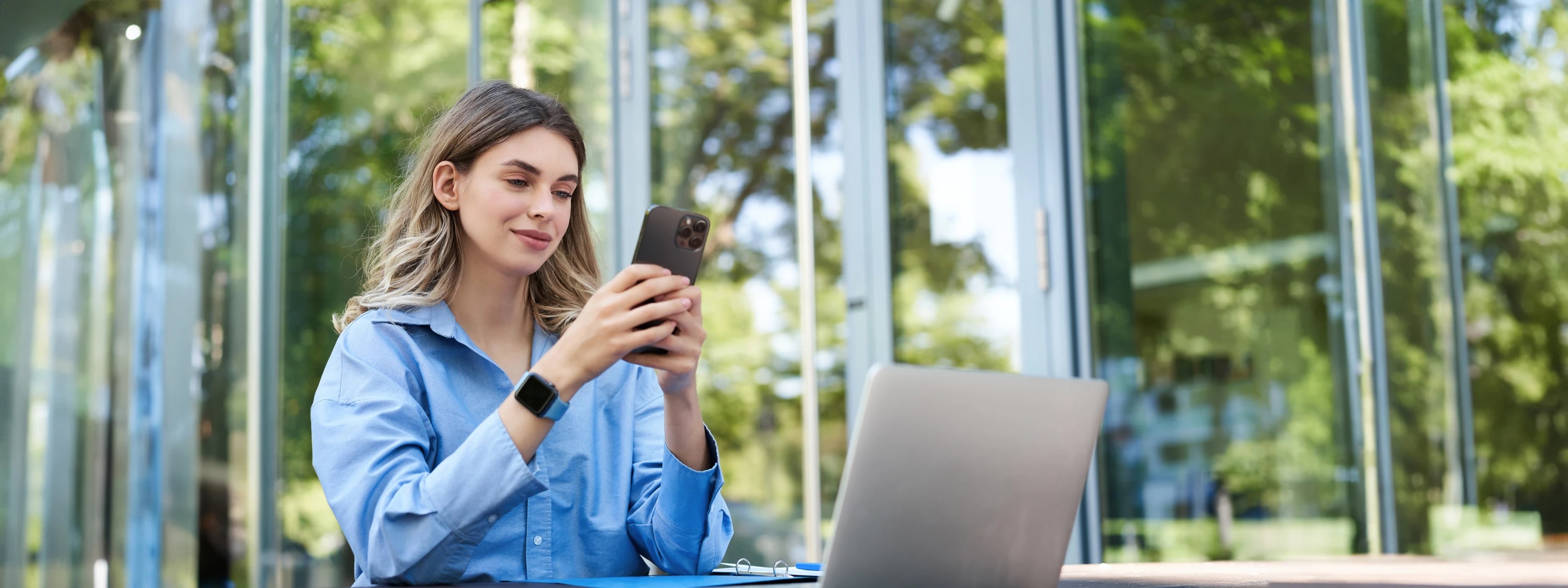An attorney reviewing a matter on her phone